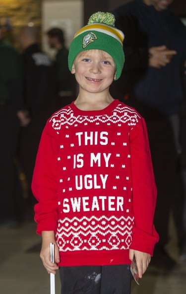 Cooper Flick, 6 joins the fun at Ugly Sweater Night during the London Knights game against the Sarnia Sting at Budweiser Gardens in London on Friday. (Mike Hensen/The London Free Press)