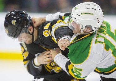 Cole Tymkin of the Knights and Marko Jakovljevic of the Sting had words during the warmup and dropped gloves nearly immediately after the game started at Budweiser Gardens in London, Ont.  Photograph taken on Friday December 13, 2019.  Mike Hensen/The London Free Press/Postmedia Network