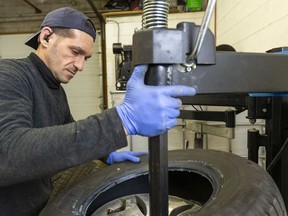 Abdulfatah Almasri, one of the many Syrian refugees who flooded into London, talks about his life in Canada, and getting back to work as a licensed mechanic.  (Mike Hensen/The London Free Press)