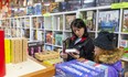 Ruby Burrell-Percival checks out some family games with her daughter Anise Burrell at L.A. Mood on Richmond Street in London, Ont. They were shoping for some deals on Boxing Day. Photograph taken on Thursday December 26, 2019.  Mike Hensen/The London Free Press/Postmedia Network