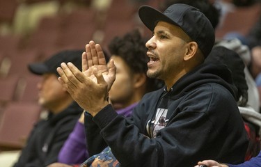 Windsor's Kyle Fazekas was an enthusiastic supporter of his son's Kennedy Collegiate team as they defeated the St. Paul Wolverines in a semi-final of the 62nd annual Purple and White basketball tournament held in London. Photograph taken on Sunday December 29, 2019. 
Mike Hensen/The London Free Press/Postmedia Network