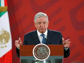 Mexico's President Andres Manuel Lopez Obrador has squeezed the power of old neoliberal elites but also swiftly ratified the new trade deal with the U.S. and Canada in his first year in power. (Henry Romero/Reuters)