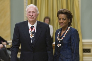 Richard Macaulay Ivey receives the award for his wife Beryl Ivey (deceased)  ..Former Prime Minister Jean Chretien (right) who  became a  companion of the order watches the governor general arrive.. Governor General Michaelle Jean presents the Order of Canada at Rideau hall.     Photo by Chris Mikula, The Ottawa Citizen, Canwest News Service.