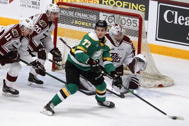 London Knights' Matvey Guskov looks to pass against Peterborough Petes' Zach Gallant, Declan Chisholm and goalie Hunter Jones during first period OHL action on Thursday December 5, 2019 at the Memorial Centre in Peterborough, Ont.