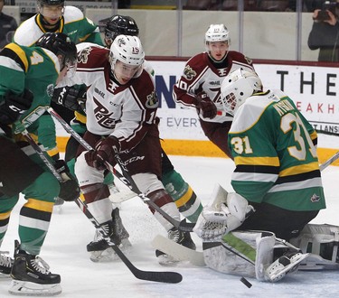 Peterborough Petes' Keegan McMullen pokes at a rebound in front of London Knights' goalie Dylan Myskiw during second period OHL action on Thursday December 5, 2019 at the Memorial Centre in Peterborough, Ont.