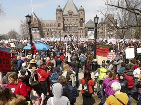 Thousands of teachers, students and union leaders gathered on the front lawn at Queen's Park to protest the Ford government's education cuts on Saturday, April 6, 2019.