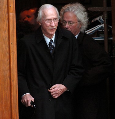 Richard Ivey leaves with his son Richard Ivey Jr. following a memorial sevice for his wife Beryl at St. Paul's Anglican church Friday .