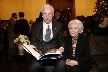 SUN Around the Town - Binea Press and The Book Store at Western held a book launch for a new photography book entitled "Western", by photographer Richard Bain with forward by Kevin Newman.  The launch Nov. 18/04 was held at Windermere Manor Conference Centre at the University of Western Ontario. Richard and Beryl Ivey look over the new Western book.