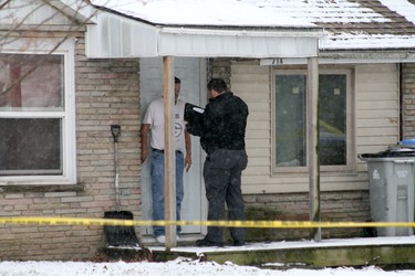 Simcoe Street between Andrew and Albert streets in Exeter is still taped off. (Scott Nixon, Postmedia Network)