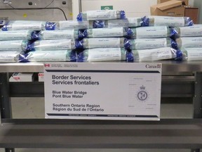 The Canada Border Services Agency provided this photo of 50 bricks of suspected cocaine alleged to have been found Dec. 2 in the cab of a transport truck at the Blue Water Bridge.