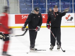 London Knights head coach Dale Hunter is running the bench for Canada's world junior hockey team. He's seen here at a practice in Oakville earlier this month. (Stan Behal/Toronto Sun)