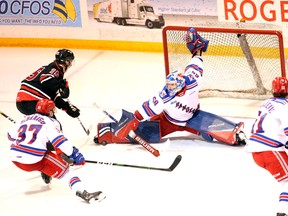 Rangers goalie Jacob Ingham stretches out to stop a Matthew Struthers shot in the third period as Owen Sound hosts Kitchener inside the Harry Lumley Bayshore Community Centre Saturday night. Greg Cowan/The Sun Times