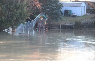 The backyard of this home on King Street West in Chatham is one of several that are partially under water due to the high level of the Thames River on Wednesday January 15, 2020. (Ellwood Shreve/Postmedia Network)