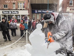 It's a frosty scene as an ice carver gets into his work at Bracebridge's Fire and Ice Festival, on until Jan. 25.