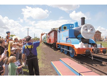 Children and parents cheer the arrival of Thomas the Tank Engine during Day Out With Thomas in St. Thomas. (Postmedia Network file photo)