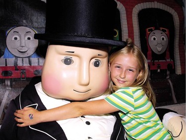 Makenna Elliott gives Sir Topham Hatt a big hug during the first day of A Day out with Thomas the Tank Engine at St. Thomas-Elgin Memorial Centre. (File photo)