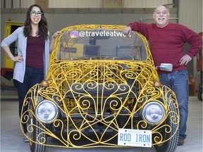 Ashley Ann Mentley and her father, Brian Mentley, are pictured with the family's 1967 Volkswagon Beetle, made out of wrought iron, Monday, January 27, 2020.