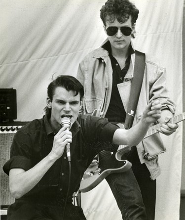 Paul Humphreys and Chris Wardman of the Blue Peter rock band entertain a crowd at Victoria Park, 1984. (London Free Press files)