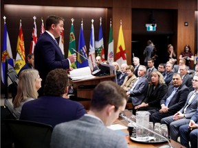Canada's Conservative Party leader Andrew Scheer speaks to his caucus on Parliament Hill Friday. Conventional wisdom says he lost the election because of his social conservatism. But Tories aren't the only Canadians who are torn over issues such as abortion or gay rights.