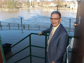 Eddie Mariconda, long-timed owner of Boyes & Herd Men's Wear, seen here on the back steps of his downtown Chatham business on Wednesday, has seen several floods from the Thames River in Chatham over the years. (Ellwood Shreve/Chatham Daily News)