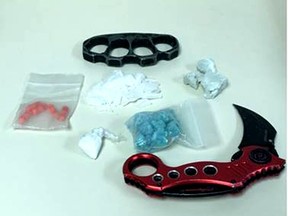 Chatham-Kent police seized an estimated $10,000 in drugs, brass knuckles and a karambit in a Tuesday afternoon drug raid at an Elizabeth Street home in Chatham Tuesday afternoon. (Supplied)