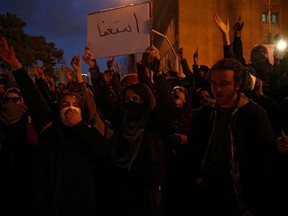 Iranians gather to show their sympathy to the victims of the crash of the Boeing 737-800 plane, flight PS 752, in Tehran, Iran January 11, 2020.