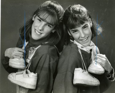 Jennifer & Julie Armstrong to carry the torch for 1988 Winter Olympics, 1987. They are track and field runners. (London Free Press files)