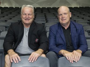 The Hunter brothers Dale (left) and Mark will helmed Canada's world junior hockey team. Photo shot in London, Ont. on Thursday July 25, 2019.