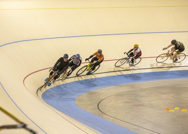 Cyclists ride through one of the Forest City Velodrome's 55-degree corners in London on Sunday. The facility is hosting the Forest City Velodrome Challenge on February 1st and 2nd. The weekend will feature top racers from North America competing for $16,000 in prize money. Derek Ruttan/The London Free Press/Postmedia Network