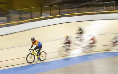 Conrad Mrowiec leads a group of cyclists during a morning ride at the Forest City Velodrome  in London on Sunday. Derek Ruttan/The London Free Press/Postmedia Network