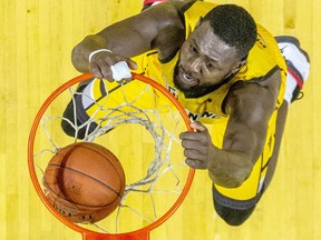 The London Lightning's Randy Phillips delivers a slam dunk during their game against the Sudbury Five at Budweiser Gardens in London on Sunday January 5, 2020. Derek Ruttan/The London Free Press/Postmedia Network