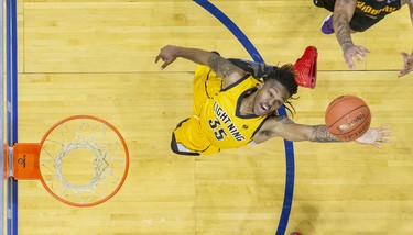 The London Lightning's  A.J. Gaines  reaches for a rebound during their basketball game against the Sudbury Five at the Budweiser Gardens in London, Ont. on Sunday January 5, 2020. Derek Ruttan/The London Free Press/Postmedia Network