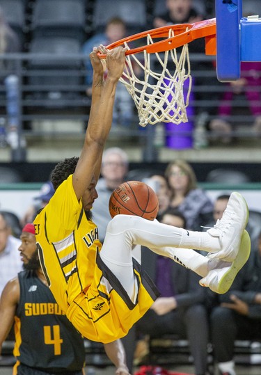 The London Lightning's Marcus Capers slam dunks during their basketball game against the Sudbury Five at the Budweiser Gardens in London, Ont. on Sunday January 5, 2020. Derek Ruttan/The London Free Press/Postmedia Network