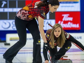 Lisa Weagle sweeps the ice in front of a rock thrown by Team Canada skip Rachel Homan during the opening round of the Continental Cup against Team Europe at the Western Fair Sports Centre in London, Ont. on Thursday Jan. 9, 2020. The Canadian's won the contest 6-5. Derek Ruttan/The London Free Press
