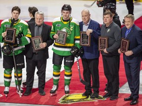 The London Knights presented Team Canada members with plaques in recognition of their gold medal at the 2020 World Junior Tournament prior to their game against the Barrie Colts on Jan. 10. L TO R Connor McMichael, Dale Hunter (coach), Liam Foudy, Mark Hunter (GM), Chris Maton (equipment manager), and Bob Martin (head of security). Derek Ruttan/The London Free Press/Postmedia Network