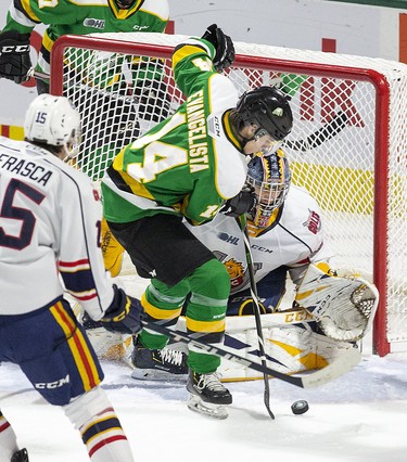 London Knights forward Luke Evangelista encroaches Barrie Colts goalie Arturs Silvos during their game at Budweiser Gardens in London, Ont. on Saturday January 11, 2020. Derek Ruttan/The London Free Press/Postmedia Network