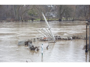 The Thames River spilled its banks around the forks in London after record amounts of rain fell over the weekend. Water remained high on Monday. (Derek Ruttan/The London Free Press)