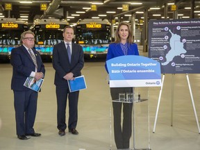 Improved public transit and regional rail service highlight a draft Southwestern Ontario transport plan unveiled by Ontario Transportation Minister Caroline Mulroney Friday. Joining her for the announcement were London Mayor Ed Holder, left, and area cabinet minister Jeff Yurek (PC-Elgin-Middlesex-London). (Derek Ruttan/The London Free Press)