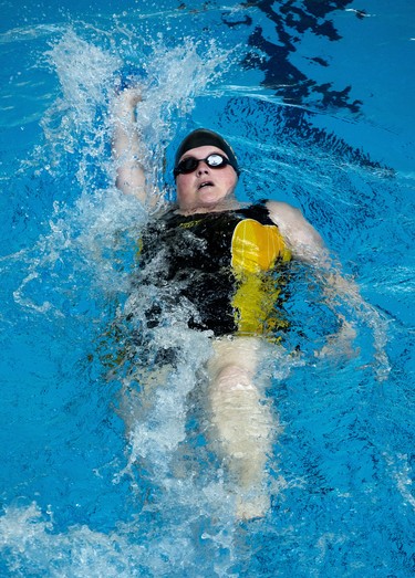Ashley Haskett of the Simcoe Dolphins competes in the 100m backstroke during the 3rd Annual London Gliders Swim Meet. 180 swimmers from 12 clubs across Southwestern Ontario competed in the Special Olympics meet at the Aquatic Centre in London on Sunday January 19, 2020.  Derek Ruttan/The London Free Press/Postmedia Network