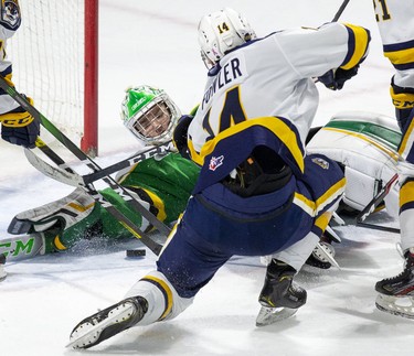 Erie Otter Hayden Fowler cannot get the puck past London Knight goalie Brett Brochu during the third period of their game at Budweiser Gardens in London, Ont. on Sunday January 19, 2020. Derek Ruttan/The London Free Press/Postmedia Network