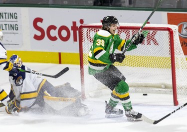 Max McCue of the London Knights celebrates after beating Erie Otters goalie Daniel Murphy for his first goal in the OHL during the third period of their game at Budweiser Gardens in London, Ont. on Sunday January 19, 2020. Derek Ruttan/The London Free Press/Postmedia Network