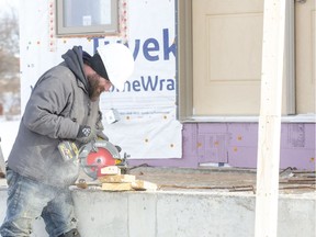 Carpenter Chris Cowell of Everton Homes works on a site in the second phase of the Eagle Ridge subdivision in London on Tuesday. (Derek Ruttan/The London Free Press)