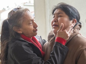 Denise Elijah consoles her niece Cindy Chrisjohn outside the courthouse in London on Friday. Chrisjohn became emotional while speaking to media about her sister, Debra Chrisjohn, who died while in police custody. London police Const. Nicholas Doering was found guilty of criminal negligence causing death and failing to provide the necessaries of life in the 2016 death. Derek Ruttan/The London Free Press/Postmedia Network