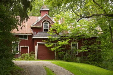 An old barn, retreating into the woods is part of the old Payne's Mills community that may become a new heritage conservation district in London, Ont.  (Mike Hensen/The London Free Press)