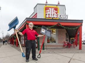 Rob Borshell of Tuckey Hardware in Old South, isn't afraid of running out of snow shovels or salt, or snowblowers in fact.  The mild weather has deterred people from buying their winter supplies. (Mike Hensen/The London Free Press)