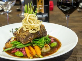 Braised beef short rib with forest mushroom risotto, seasonal vegetables, basil pesto and crispy leeks will be a challenging recipes for visitors to the London Wine and Food Show to learn this weekend.  (Mike Hensen/The London Free Press)