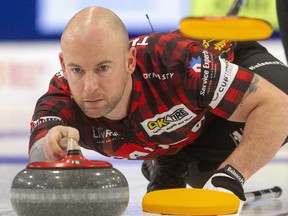 Ryan Fry throws third for skip Brendan Bottcher during Canada's Friday morning Continental Cup match against Europe skipped by Niklas Edin at the Western Fair Sports Centre in London, Ont.  (Mike Hensen/The London Free Press)