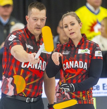 Ben Hebert and Rachel Homan of Team Canada try to figure out what's going wrong after falling behind 7-0 after two ends to Europe's mixed doubles duo of Eve Muirhead and Bobbie Lammie at the Continental Cup curling competition Saturday January 11, 2020 at the Western Fair Sports Centre. The match ended after 7 ends with Europe winning 10-2. Mike Hensen/The London Free Press/Postmedia Network