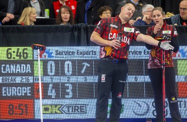 Ben Hebert and Rachel Homan of Team Canada try to figure out what went wrong after falling behind 7-0 after two ends to Europe's mixed doubles duo of Eve Muirhead and Bobbie Lammie at the Continental Cup curling competition Saturday January 11, 2020 at the Western Fair Sports Centre. The match ended after 7 ends with Europe winning 10-2. Mike Hensen/The London Free Press/Postmedia Network