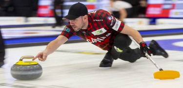 John Epping delivers a rock during the mixed doubles competition at the Continental Cup curling event Saturday January 11, 2020 at the Western Fair Sports Centre. Epping and partner Lisa Weagle lost 8-4 to Melanie Barbezat and Peter De Cruz. Mike Hensen/The London Free Press/Postmedia Network